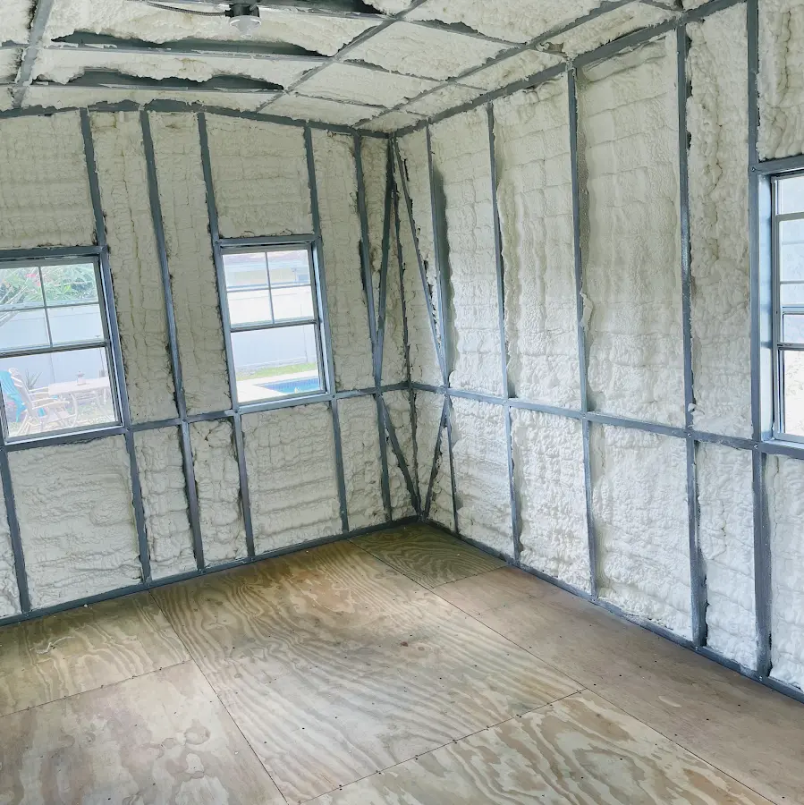 Closed-cell spray foam insulation applied to wall cavities in a residential project in Teaneck